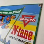 Vintage Conoco Gasoline Sign – Porcelain Gas Pump Superman Comic Figure Sign - Image 12
