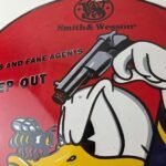 Vintage Smith & Wesson Porcelain Sign – Donald Duck Ad Gas Pump Firearms Sign - Image 3