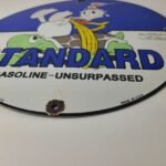 Vintage Standard Gasoline Sign – Gas Oil Pump Plate Walt Disney Porcelain Sign - Image 11