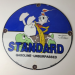 Vintage Standard Gasoline Sign – Gas Oil Pump Plate Walt Disney Porcelain Sign - Image 12