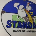 Vintage Standard Gasoline Sign – Gas Oil Pump Plate Walt Disney Porcelain Sign - Image 6