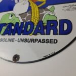 Vintage Standard Gasoline Sign – Gas Oil Pump Plate Walt Disney Porcelain Sign - Image 10