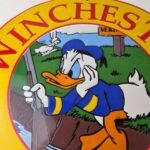 Vintage Winchester Porcelain Sign – Disney Duck Shot Gun Firearms Gas Pump Sign - Image 3