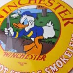 Vintage Winchester Porcelain Sign – Disney Duck Shot Gun Firearms Gas Pump Sign - Image 4